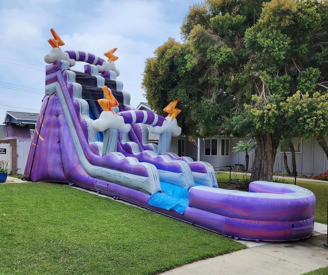 Lightning-themed water slide inflatable rental for parties and events