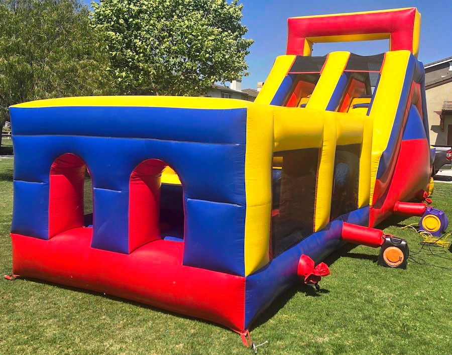 Obstacle course inflatable with multiple challenge stations