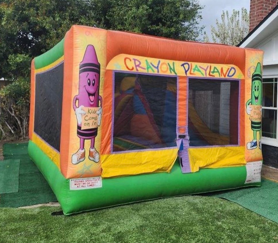 Crayon playland jumper inflatable showing additional view of the structure.