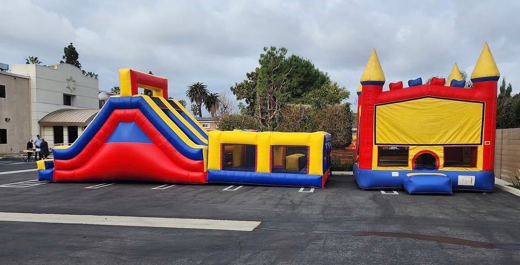 Bounce jumper attached to inflatable obstacle course unit