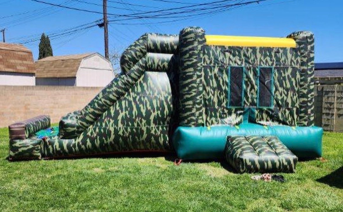 Camouflage-themed combo bounce house with jumping and play areas
